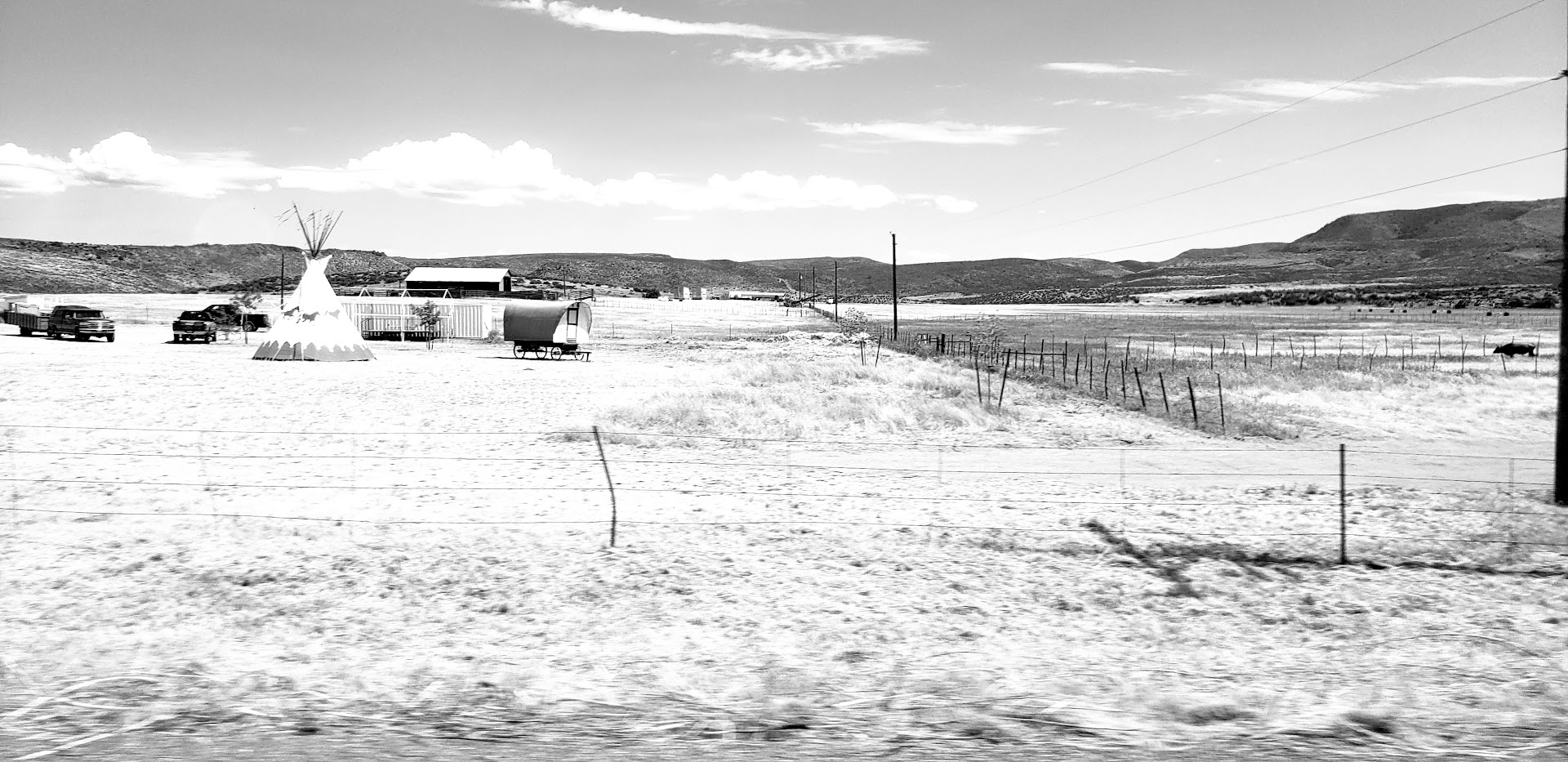 A black and white photo of an empty field.