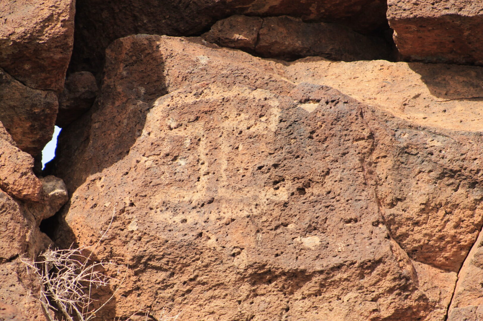 A rock with some writing on it