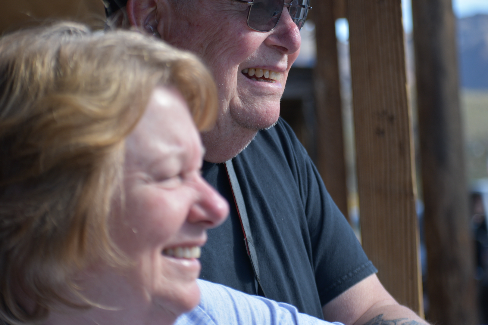 A man and woman smiling for the camera.