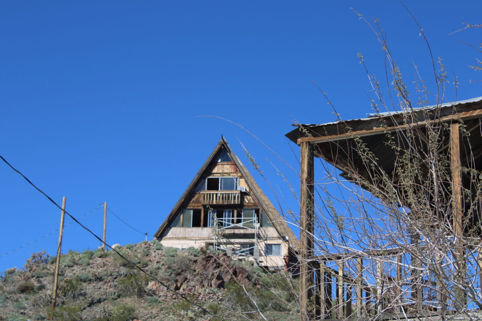 A house sitting on top of a hill.