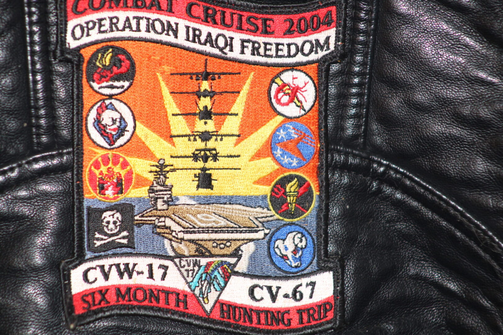 A patch of the military on a jacket.