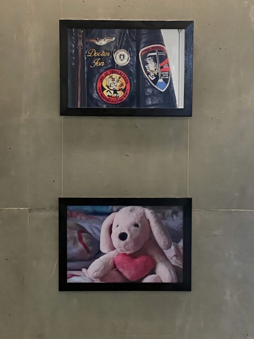 A picture of a stuffed animal and a framed photo.